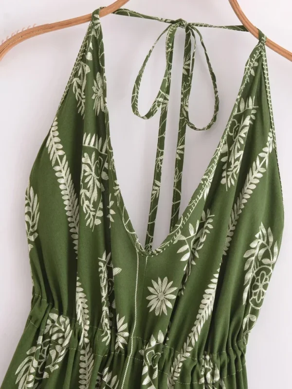 S6055e418db6948a69c1615d1a18f0b3bM.webp Desert Bloom: Floral Print Backless Halter Maxi with Tassel Hem