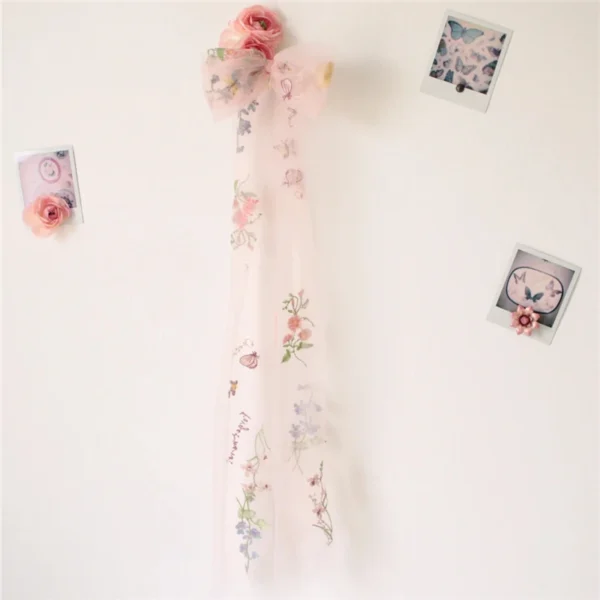 S6806ec11445a4807beb0acdc435fdcd4V.webp Romantic Whispers Bow Veil With Comb featured in Floral Embroidery
