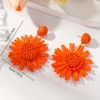S682d2b7630204565b87c39713a9b60dak.webp Mediterranean Bloom Raffia Flower Dangle Earrings