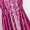 S6d748f72c8724312aa5e99e3e91105ecT.webp Desert Bloom: Floral Print Backless Halter Maxi with Tassel Hem