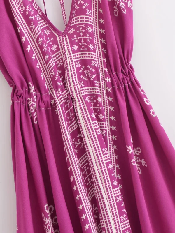 S6d748f72c8724312aa5e99e3e91105ecT.webp Desert Bloom: Floral Print Backless Halter Maxi with Tassel Hem