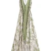 S70ca2b1ccb124f6290e64bc24efb2610V.webp Desert Bloom: Floral Print Backless Halter Maxi with Tassel Hem