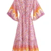 S751d82cacb5540e59977a50996d59d83w.webp Free Spirit Bohemian Dress with Flowing Sleeves and Floral Detail