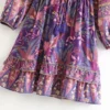 S7a10237bb4e04531863bb3524e0a2dcbE.webp Serenade A-Line Floral Bohemian Dress with Ruffle Hem and Tassel Tie