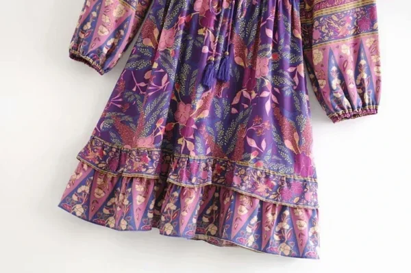 S7a10237bb4e04531863bb3524e0a2dcbE.webp Serenade A-Line Floral Bohemian Dress with Ruffle Hem and Tassel Tie