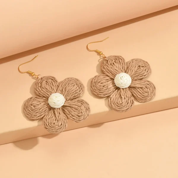 S7a452b1fb27b42fa99a5276126863a9a7.webp Textured Hand-Woven Raffia Bloom Earrings