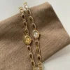S7cc167436495466898f29bcca85f7a8fa.webp Elysian Gemstone Embellished Wristwatch with Bracelet Strap
