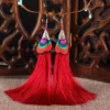 S7dd3f68d9e7a4d27bb48ae9611ab0bb9N.webp Oriental-Inspired Boho Earrings with Colorful Tassel Design