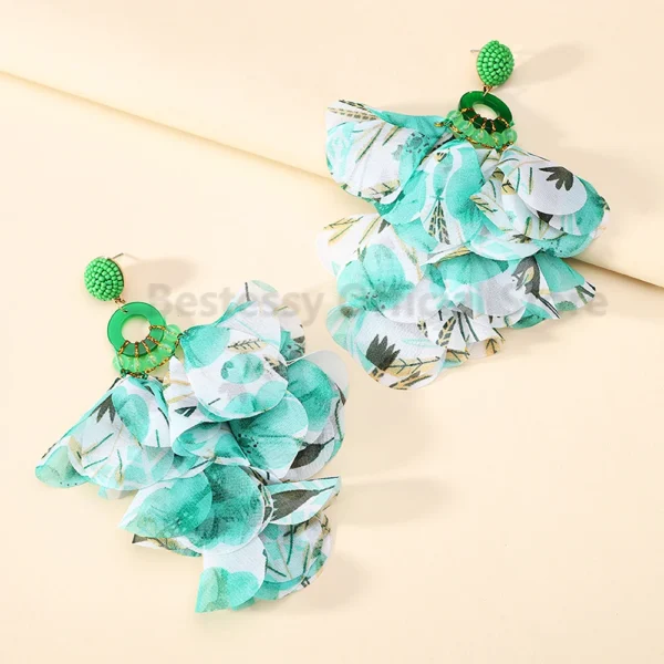 S7f278687ba7d434d86e1b704e0afedcdE.webp Radiant Blooms Floral Statement Earrings with Layered Petals
