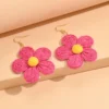 S7f4034ed18244ded9c214a4cbd428ddfZ.webp Textured Hand-Woven Raffia Bloom Earrings