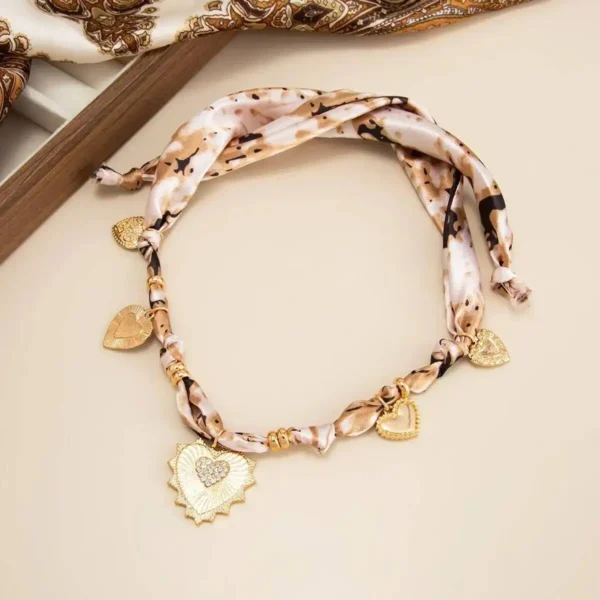 S7f6399311b914b7aab723389c918e482X.webp Romantic Serenade Necklace Gold Heart Charm with Animal Print Ribbon
