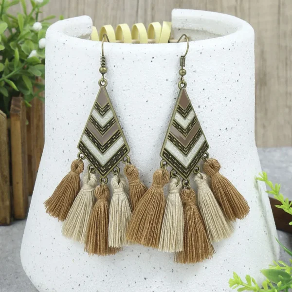 S7fe5fef4840944fa872e4c4dc0979368F.webp Odyssey Dangle Boho Tassel Earrings with Geometric Metal Accents