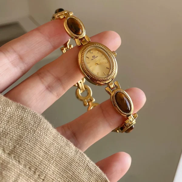 S8180d68f64e743e1a42a56319f78ca19H.webp Elysian Gemstone Embellished Wristwatch with Bracelet Strap