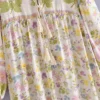 S827e9abc5956490bb52b5b5f6727e2735.webp Wilderness Boho Floral Bohemian Dress with Tassels and Tie-Front