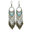 S85f0207822104af8aedc56ef6b3bd969x.webp Dream Big Boho Earrings with Cascading Beads and Leaf Accents