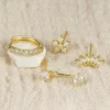 S868f30a4aee54f1ea522a6cede6a717aq.webp Festive Glint Earring Set 4pcs with Crystal Accents – Spirit & Rebel