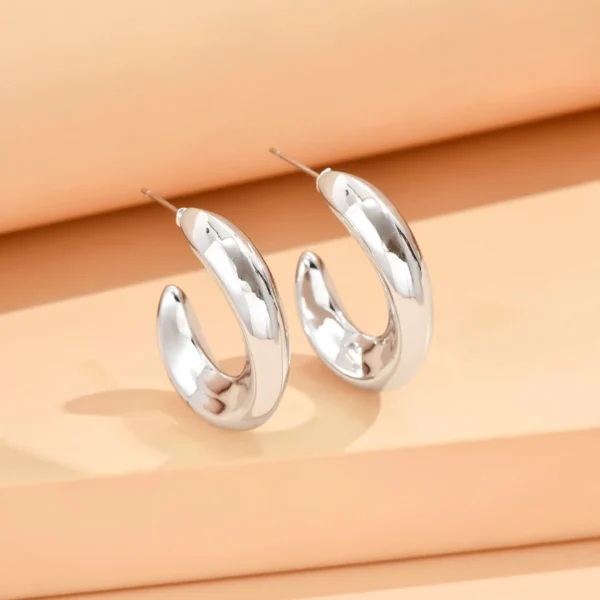 S8a24d1c8f3944ca6987bf71ca069237aK.webp Irregular Crinkle Studs - Hammered Silver and Gold Earrings