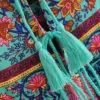 S8b78c5c1f37940c3a1ab0e9226f08b4dJ.webp Wilderness Boho Floral Bohemian Dress with Tassels and Tie-Front