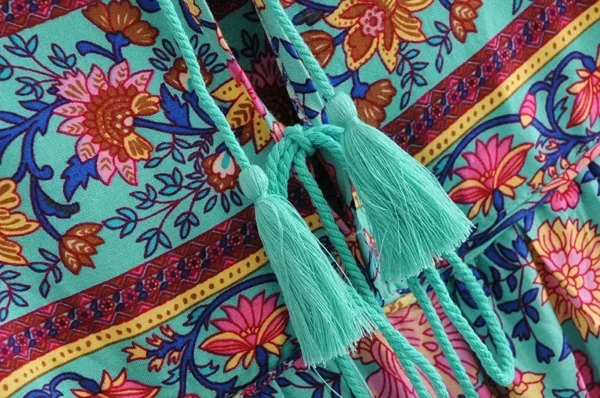 S8b78c5c1f37940c3a1ab0e9226f08b4dJ.webp Wilderness Boho Floral Bohemian Dress with Tassels and Tie-Front