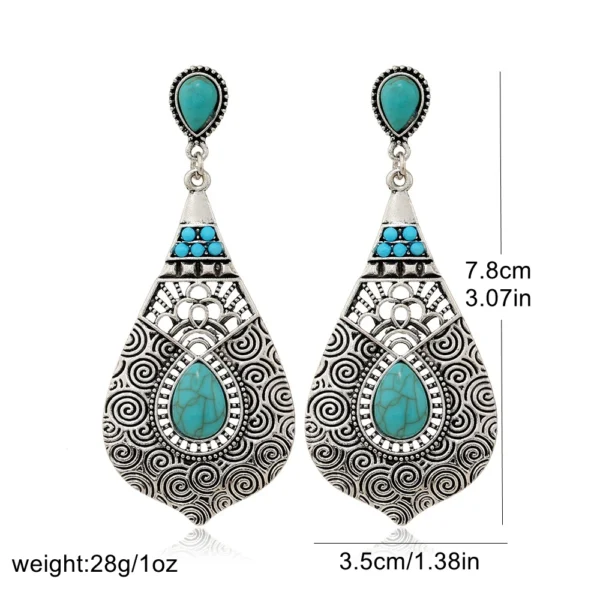 S90aaf2d2bb57472ba5d89e08e9a13e3e1.webp Intricate Silver Boho Earrings with Turquoise Accents