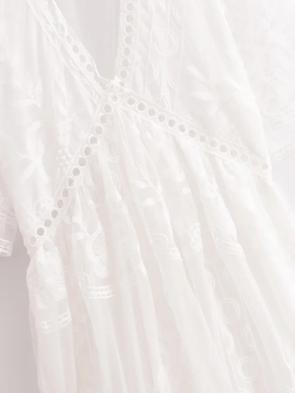S91d769d837044f9fadecf673698eacd9K.webp Dreamweaver White Bohemian Lace Maxi Dress with Sheer Overlay