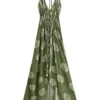 S93d689f55621409dbcb5e6660caeebbe5.webp Desert Bloom: Floral Print Backless Halter Maxi with Tassel Hem