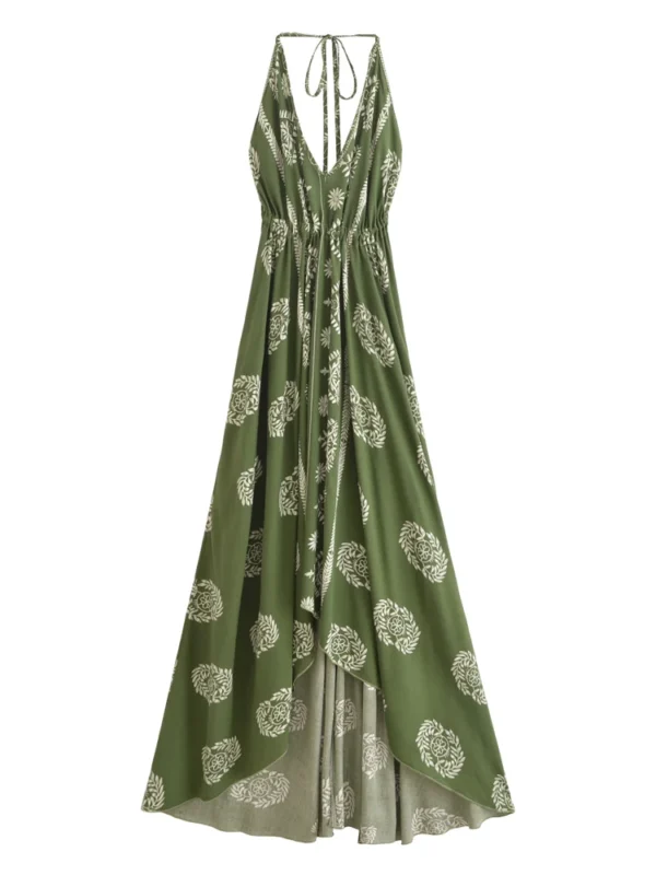 S93d689f55621409dbcb5e6660caeebbe5.webp Desert Bloom: Floral Print Backless Halter Maxi with Tassel Hem