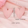 S94eef9a51dd04bf68f3575b20b1cf3c00.webp Sculpted Heart Statement Earrings