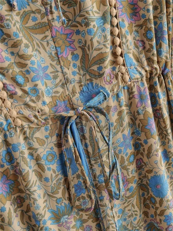 S9583e4a2c6d542378ab930a3dfba82a3J.webp Free Spirit Bohemian Dress with Flowing Sleeves and Floral Detail