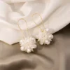 S95ab7a7da34b4a0eba6a3a7043c1efd4E.webp Blossom Harmony Floral Drop Earrings with Delicate Gold Wire