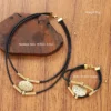 S95bf259ca3304cccb6caafdde7a376c2F.webp Earthbound Textured Pendant Necklace and Bracelet Set