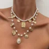 S9792a0fd7e464a848f5139091d104e1cf.webp Vintage Allure Pearl Charm Layered Necklace