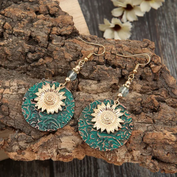 S98a69a556dff46fa85e05453252cc33e7.webp Sunlit Garden Boho Earrings with Floral Accents and Textured Discs