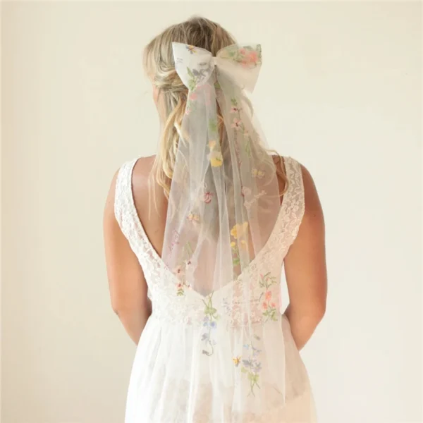 S9923ae353f384445a2d8d8205c457510m.webp Romantic Whispers Bow Veil With Comb featured in Floral Embroidery