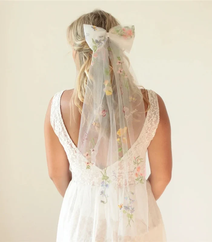 Romantic Whispers Bow Veil With Comb featured in Floral Embroidery