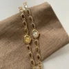S9a5d123af74242998583e1af390dc800E.webp Elysian Gemstone Embellished Wristwatch with Bracelet Strap