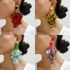 S9ad5d3a512624397929b2e145a599e6fb.webp Radiant Blooms Floral Statement Earrings with Layered Petals