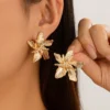 S9dc962e1357d4d5d8b30ac92c32d4c28a.webp Flower-Inspired Boho Ring with Textured Petals