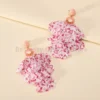 S9dd20010a7eb4e5d87dbe8ad39f628a5Q.webp Radiant Blooms Floral Statement Earrings with Layered Petals