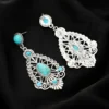 Sa127c3204f3e4414ad6b4d2b591d25c4k.webp Intricate Silver Boho Earrings with Turquoise Accents