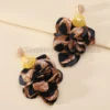 Sa26c0b60c4d74364826f5fad262f03eci.webp Radiant Blooms Floral Statement Earrings with Layered Petals