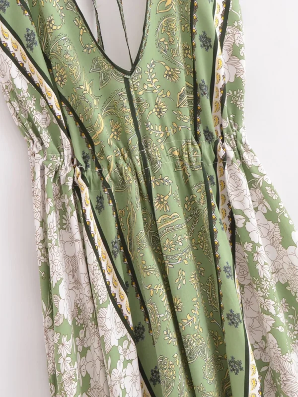 Sa27cb5a82c8e4d05a1a815874ed9bab1L.webp Desert Bloom: Floral Print Backless Halter Maxi with Tassel Hem