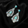 Sa35d89569f214ecc9915cfd43c64ee29t.webp Intricate Silver Boho Earrings with Turquoise Accents