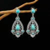 Sa4757d4e6e654528bcf64a72a3e18f196.webp Intricate Silver Boho Earrings with Turquoise Accents