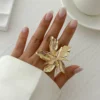 Sac1e44702b0049e3b519c32adc34ad93T.webp Flower-Inspired Boho Ring with Textured Petals