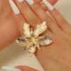 Sb345449b8b394efba8f7b183f062d754N.webp Flower-Inspired Boho Ring with Textured Petals