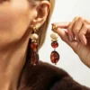 Sb3fcd77448a543939dc135fec5a54154W.webp Boho Earrings with Bold Stone Accents and Gold Highlights