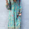 Sb84e876e13a7442697f76cbcc296c578J.webp Wilderness Boho Floral Bohemian Dress with Tassels and Tie-Front
