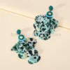 Sb8c64a2ef62c4a0185b8c6ee856c862dI.webp Radiant Blooms Floral Statement Earrings with Layered Petals