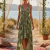 Sb9ea453497564b4e8d0342db409f0353D.webp Desert Bloom: Floral Print Backless Halter Maxi with Tassel Hem